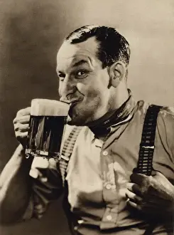 Braces Prints: Man enjoying a pint of beer