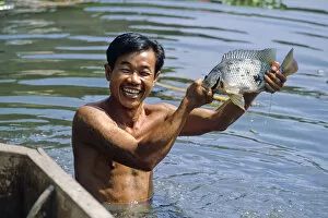 Man with fish, Bangkok