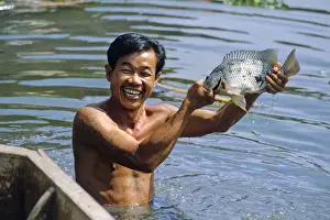 Laughter Prints: Man with fish, Bangkok