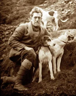 man with foxhounds