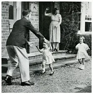 Evacuated Prints: Man greeted by his evacuated children and wife 1939