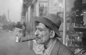 Man with homemade pipe, Washington, D. C