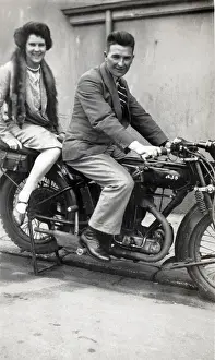 Stole Prints: Man & lady on a 1926 / 7 AJS motorcycle