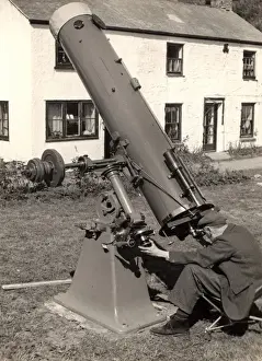 Observe Prints: Man with large telescope