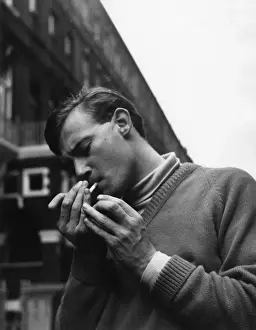 Drugs Prints: MAN LIGHTING CIGARETTE