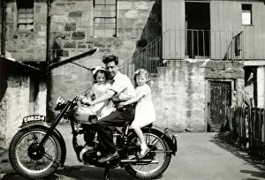 Lads Prints: Man and two little girls on BSA Gold Star motorcycle