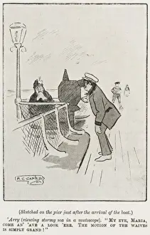 Man looking through a mutoscope on the pier