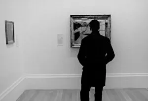 Images Dated 10th June 2016: Man looking at a painting in an art gallery