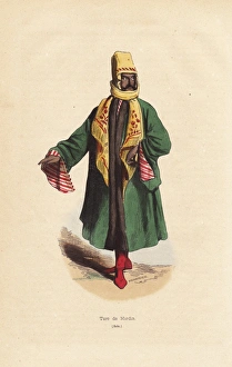 Man from Mardin, Turkey, in embroidered scarf, cape, boots Man from Mardin, Turkey, in embroidered scarf, cape, boots