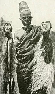Images Dated 7th August 2018: Man with two monkey heads, East Africa