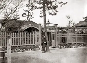 Man outside house China, circa 1880s