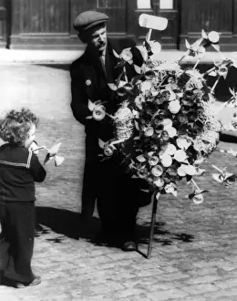 Man selling toy windmills