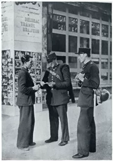 Alien Gallery: Man shows identity papers to gendarmes, September 1939
