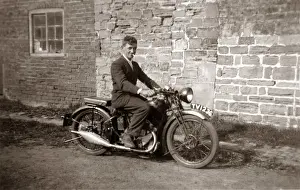 Man sitting on 1929 / 30 BSA motorcycle