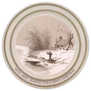 Man in the snow on a circular Christmas card