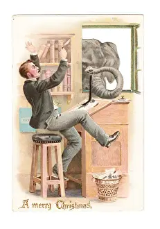 Wastepaper Prints: Man surprised by elephant on a cutout Christmas card