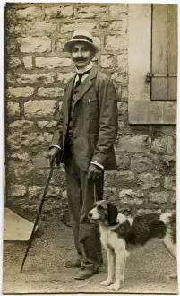 Man taking a dog for a walk