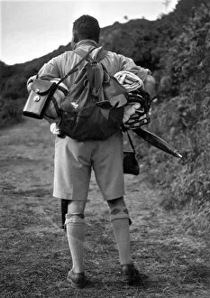 Man out walking with backpack