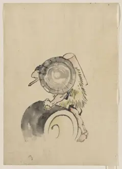 A man, wearing a large conical hat and a straw or feather ga