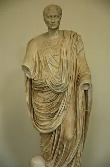 Man wearing a toga. Roman statue. 1st century AD