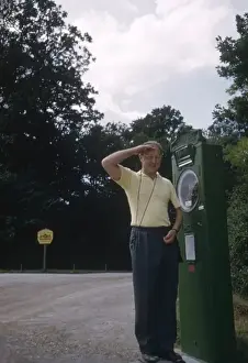 Road Side Prints: Man on a weighing machine, Austria