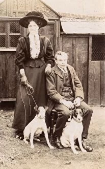 Russell Gallery: Man and woman with two Jack Russell terriers