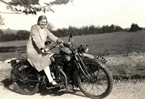 Registration Prints: Man & woman on veteran motorcycle combination