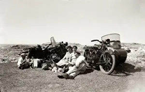 Eight Prints: Man with women beside their 1924 Coventry Eagle motorcycles