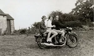 Man & two women on a 1936 BSA motorcycle