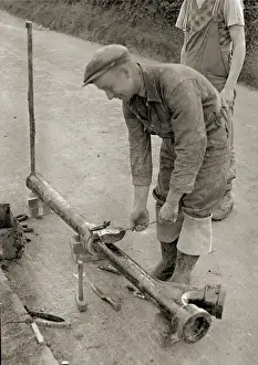 Piping Prints: Man at work on a country road