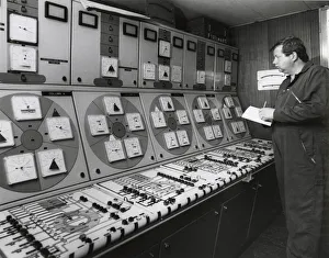 Controls Collection: Man at work in an oil rig control room