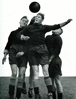 Heading Prints: Manchester City footballers heading the ball