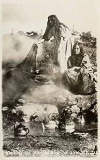 Maori Women Boiling water in a hot pool - Rotorua