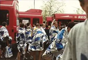 Wraps Prints: Marathon runners with silver white and blue ADT foil wraps