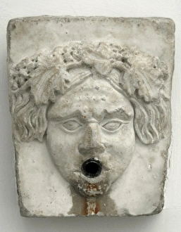 Images Dated 25th August 2007: Marble fountain pipe. Dionysiac mask