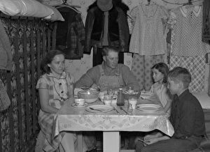Marcus Miller and family in shack that he built himself. Spe Marcus Miller and family in shack that he built himself. Spe