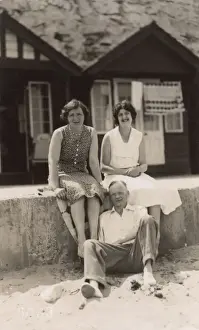 Margate, Kent - A couple and relative rest on the sea wall
