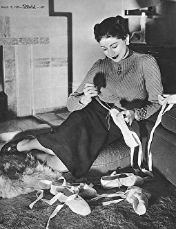 Dance Gallery: Margot Fonteyn repairing her ballet shoes