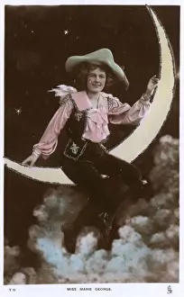 Marie George, American performer, sitting on a paper moon