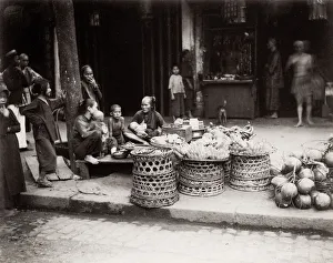 Market scene, stallholders selling food, Vietnam