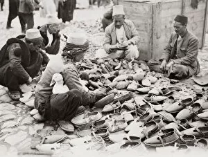 Duck Gallery: Market, Tirana, Albania, 1933, shoe seller and duck