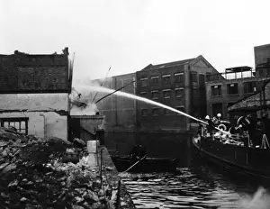 Fireboat Prints: Massey Shaw fireboat at work on the River Thames