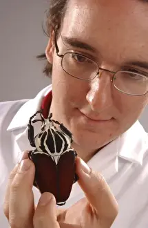 Entomological Prints: Max Barclay with beetle specimen