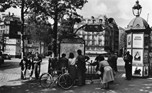 Images Dated 12th April 2012: Members of the public stop to look at a map