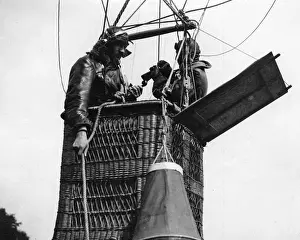Telephones Prints: Men in basket of observation balloon, WW1