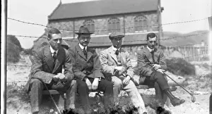 Casualty Prints: Four men on a bench at golf club