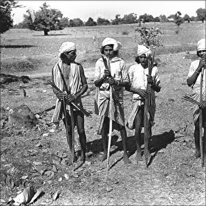 Men with bows and arrows, Madhya Pradesh, India