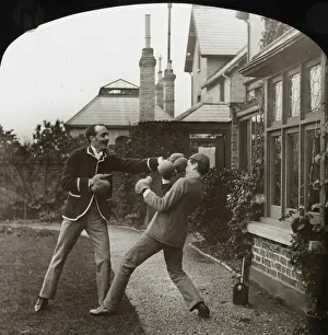 Appears Prints: Two men in boxing gloves outside a house