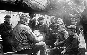 Men and boys playing cards, Penzance, Cornwall