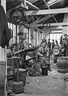 Men and boys in a workshop